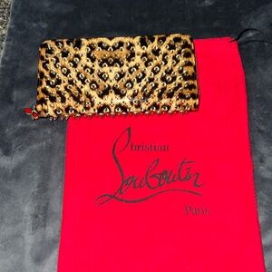 EXCELLENT CONDITION CHRISTIAN LOUBOUTIN SPIKED LEPORD WALLET (RARE)💗💗💗